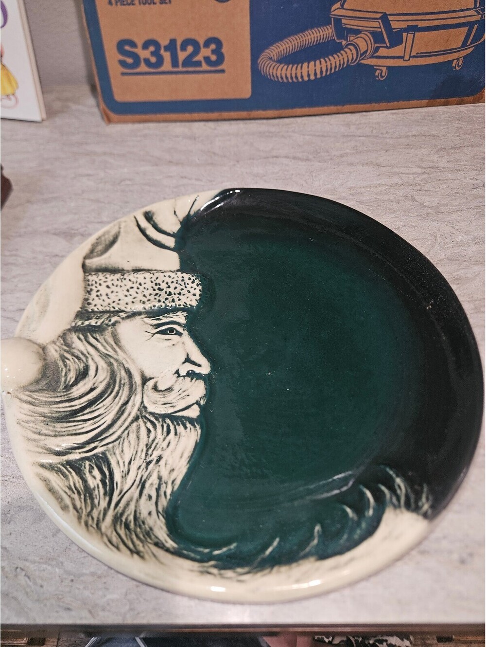 Vintage pottery plate by flat earth